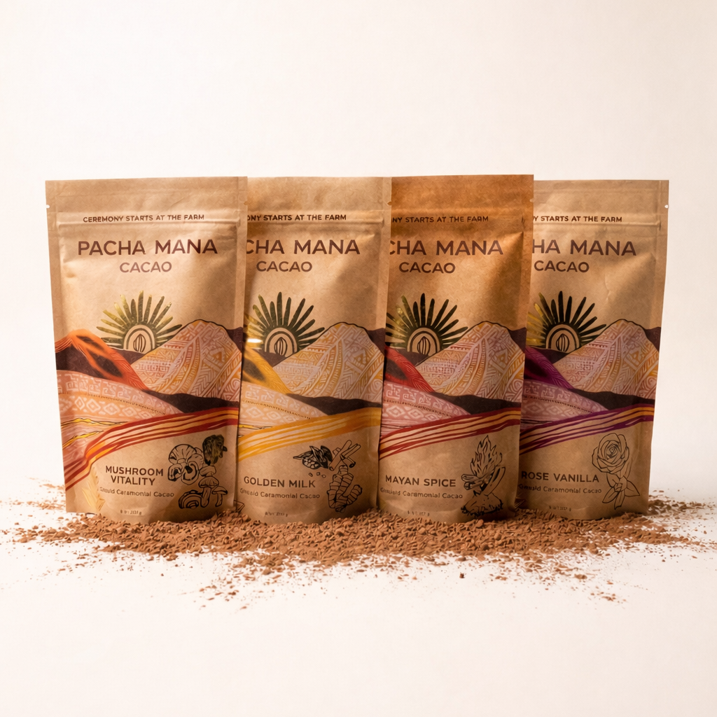 Four Pacha Manana cacao packages on a white background with cocoa powder.